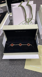 VAN CLEEF ROJA CON DORADO