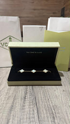 VAN CLEEF BLANCO CON DORADO