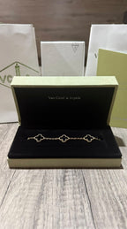 VAN CLEEF DORADA CON NEGRO